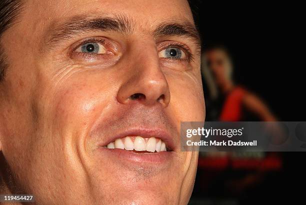 Former Essendon AFL player Matthew Lloyd speaks to the media at the launch of his book 'Straight Shooter' at Windy Hill on July 21, 2011 in...