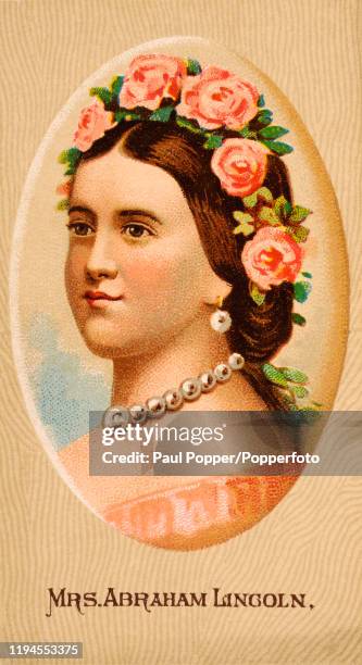 Vintage cigarette card, one of a series of Portraits of Ladies of the White House, featuring an illustration of Mary Todd Lincoln, wife of...