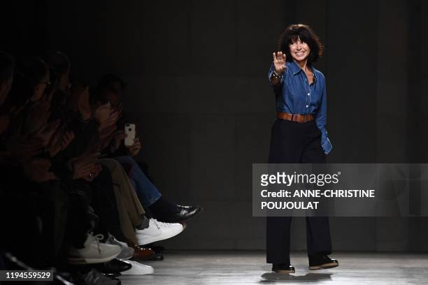 Designer Veronique Nichanian acknowledges the public at the end of the Hermes show during men's Fashion Week for the Fall/Winter 2020/21 collection...