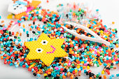 Toy in star form. Just made of fusible beads. Set, close up view