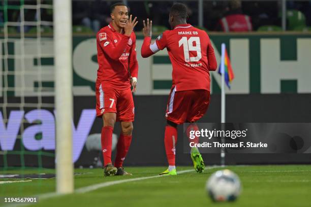 Robin Quaison of Mainz celebrates his third goal with Moussa Niakhate of Mainz during the Bundesliga match between SV Werder Bremen and 1. FSV Mainz...