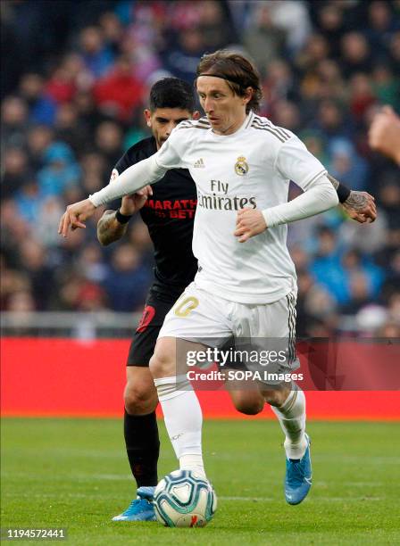 Real Madrid CF's Luka Modric seen in action during the Spanish La Liga match round 20 between Real Madrid and Granada CF at Santiago Bernabeu Stadium...