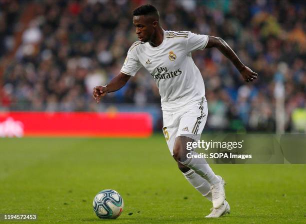 Real Madrid CF's Vinicius Jr seen in action during the Spanish La Liga match round 20 between Real Madrid and Granada CF at Santiago Bernabeu Stadium...