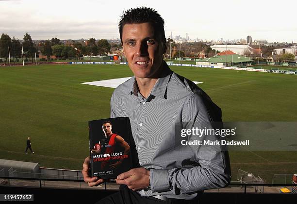 Former Essendon AFL player Matthew Lloyd poses for the media at the launch of his book 'Straight Shooter' at Windy Hill on July 21, 2011 in...