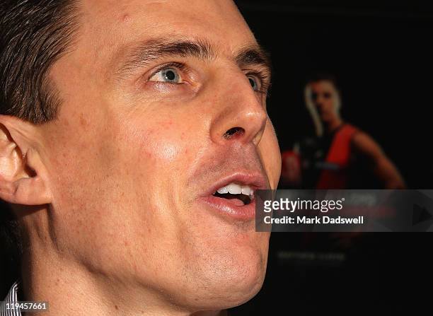 Former Essendon AFL player Matthew Lloyd speaks to the media at the launch of his book 'Straight Shooter' at Windy Hill on July 21, 2011 in...