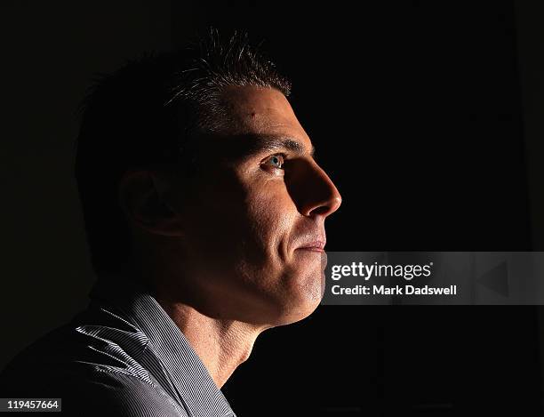 Former Essendon AFL player Matthew Lloyd speaks to the media at the launch of his book 'Straight Shooter' at Windy Hill on July 21, 2011 in...