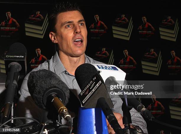 Former Essendon AFL player Matthew Lloyd speaks to the media at the launch of his book 'Straight Shooter' at Windy Hill on July 21, 2011 in...