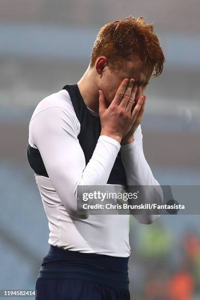 Sepp Van Den Berg of Liverpool reacts following the Carabao Cup Quarter Final match between Aston Villa and Liverpool FC at Villa Park on December...