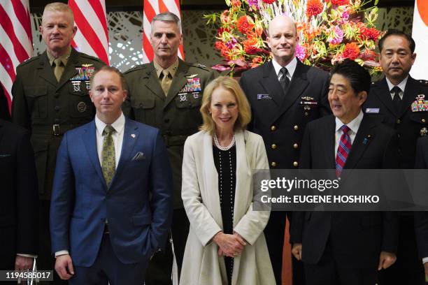 The great grandson Merrill Eisenhower Atwater and granddaughter Mary Jean Eisenhower of former US President Dwight Eisenhower, and Japan's Prime...