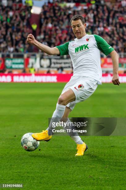Stephan Lichtsteiner of FC Augsburg controls the ball during the Bundesliga match between FC Augsburg and Borussia Dortmund at WWK-Arena on January...