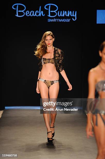 Model walks the runway for Beach Bunny during Mercedes-Benz Fashion Week Swim at The Raleigh on July 15, 2011 in Miami Beach, Florida.