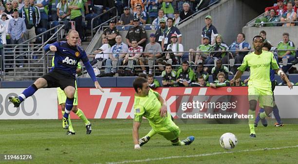 Wayne Rooney of Manchester United scores their fourth goal during the pre-season friendly match between Seattle Sounders and Manchester United at...