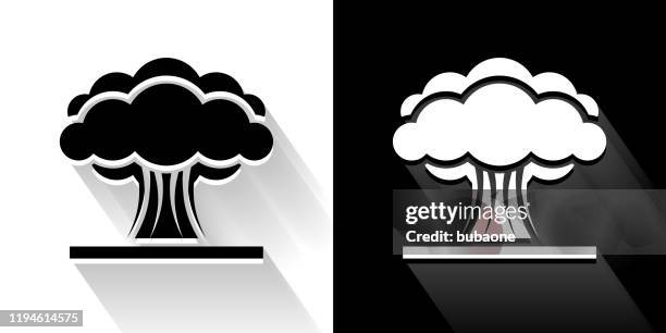 atomic explosion black and white icon with long shadow - nuclear explosion icon stock illustrations