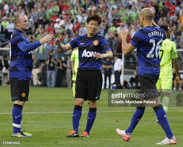 Ji-Sung Park of Manchester United celebrates scoring their fifth goal during the pre-season friendly match between Seattle Sounders and Manchester...