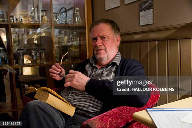 Nina LARSON A picture taken on June 28, 2011 shows the founder of Iceland's Phallological Museum, Sigurdur Hjartarson, posing during an interview in...