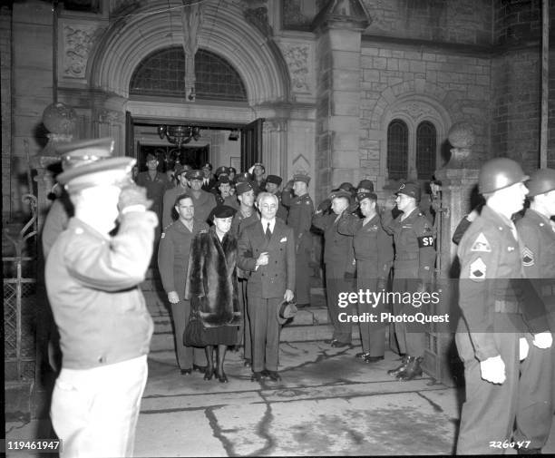 Following funeral services for her husband, Beatrice Patton leaves Christ Church on the arm of her brother, Charles Fanning Ayer , Heidelberg,...