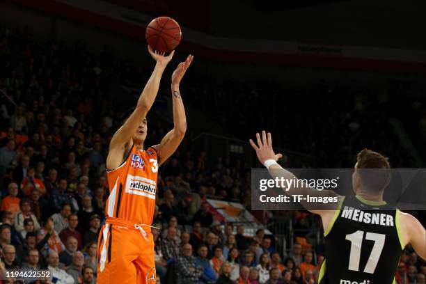 Derek Willis of Ratiopharm Ulm and Lukas Meisner of MEDI Bayreuth battle for the ball during the EasyCredit Basketball Bundesliga match between...