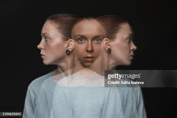 adult woman with split personality - malattia mentale foto e immagini stock