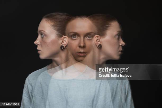 adult woman with split personality - vanity stock pictures, royalty-free photos & images