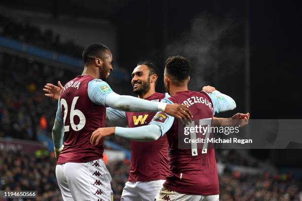 Jonathan Kodija of Aston Villa celebrates after scoring his team's fourth goal with Ahmed Elmohamady and Mahmoud Hassan during the Carabao Cup...