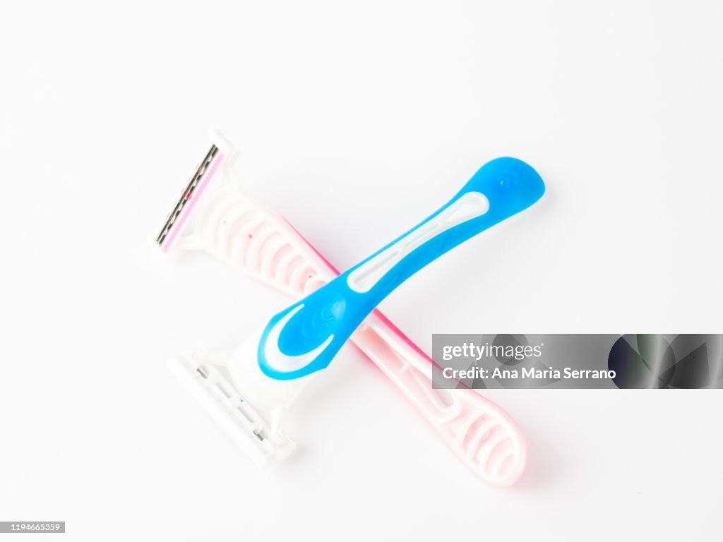 Pink Disposable Razor And Blue Disposable Razor On A White Background ...