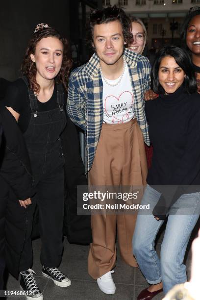 Harry Styles seen leaving BBC Radio One after performing in the Live Lounge on December 18, 2019 in London, England.