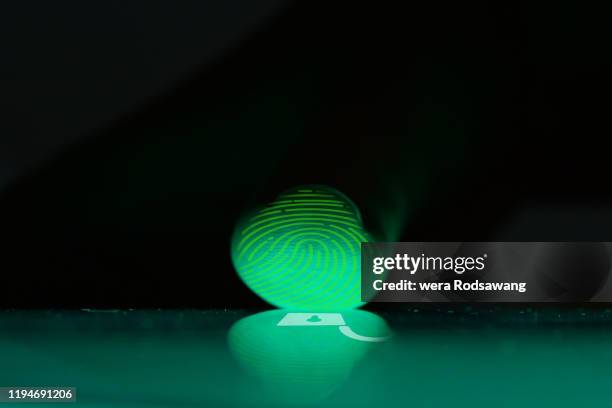 close up photography of finger while scanning touch screen to open digital device - phone lock stock pictures, royalty-free photos & images