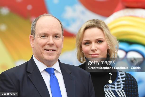 Prince Albert II of Monaco and Princess Charlene of Monaco attend the Christmas Gifts Distribution At Monaco Palace on December 18, 2019 in Monaco,...