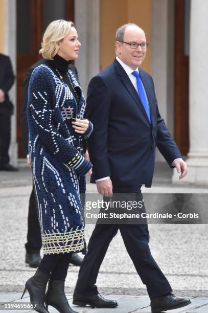 Princess Charlene of Monaco and Prince Albert II of Monaco attend the Christmas Gifts Distribution At Monaco Palace on December 18, 2019 in Monaco,...