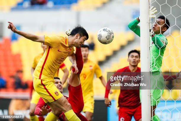 Ji Xiang of China heads the ball during the EAFF E-1 Football Championship match between Hong Kong and China at Busan Asiad Main Stadium on December...