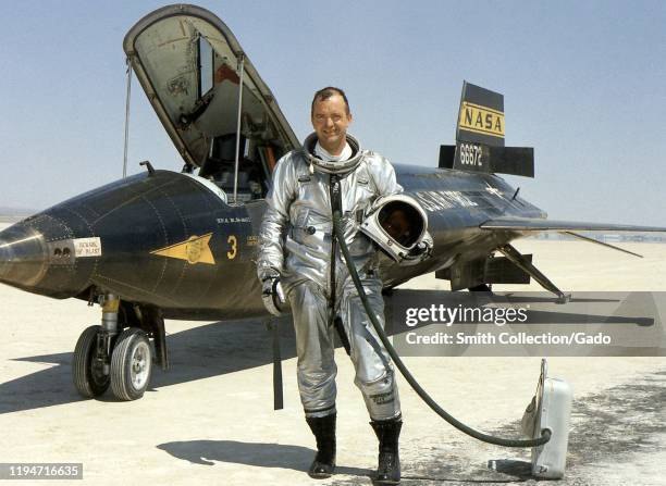 Photograph of NASA research pilot Bill Dana standing next to the the North American X-15, a hypersonic rocket-powered aircraft, October 24, 1967....