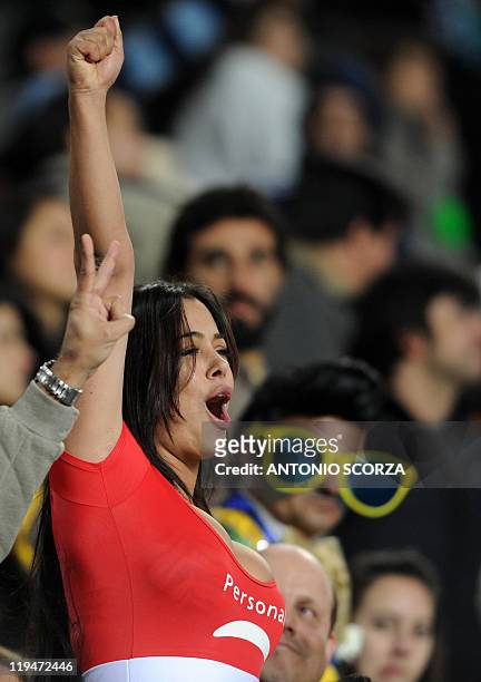 Paraguayan supporter Larissa Riquelme celebrates during the penalty shoot-out against Brazil during a 2011 Copa America quarter-final football match...