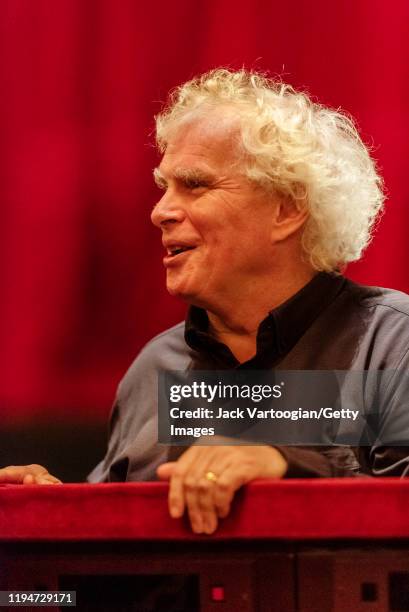 Close-up of British conductor Sir Simon Rattle during a break in the final dress rehearsal prior to the season revival of the Metropolitan...