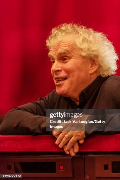 Close-up of British conductor Sir Simon Rattle during a break in the final dress rehearsal prior to the season revival of the Metropolitan...