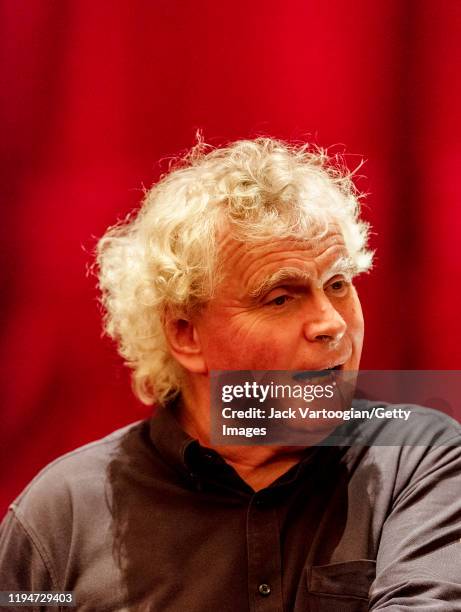 Close-up of British conductor Sir Simon Rattle during a break in the final dress rehearsal prior to the season revival of the Metropolitan...