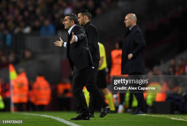 Ernesto Valverde, Manager of Barcelona reacts during the Liga match between FC Barcelona and Real Madrid CF at Camp Nou on December 18, 2019 in...