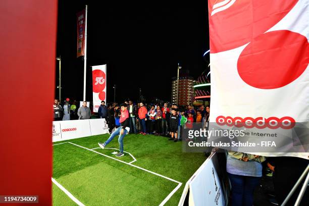 Fan enjoys the Ooredoo brand activation in the fan area outside the stadium before the FIFA Club World Cup semi-final match between Monterrey and...