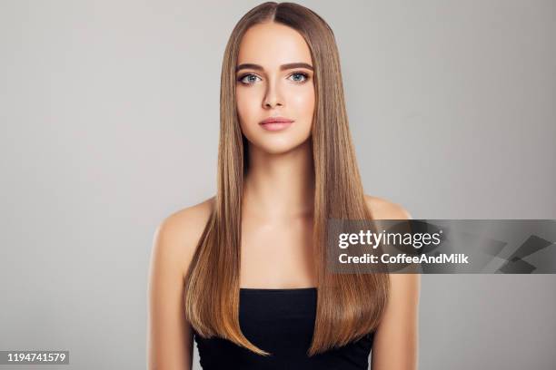 young beautiful girl - shiny straight hair stock pictures, royalty-free photos & images