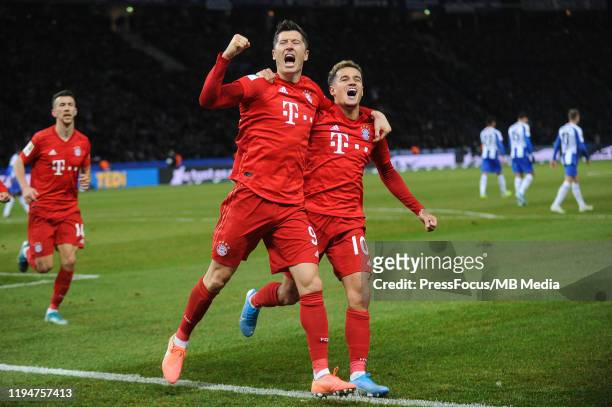 Robert Lewandowski of Bayern Munich celebrates scoring a goal with Coutinho of Bayern Munich during the Bundesliga match between Hertha BSC and FC...