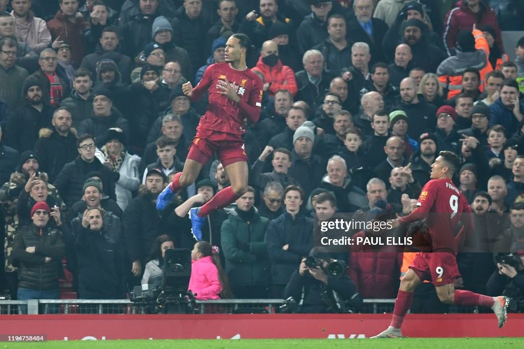 TOPSHOT-FBL-ENG-PR-LIVERPOOL-MAN UTD