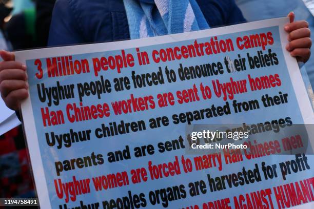 Uighur rights activists rally in solidarity with the pro-democracy movement in Hong Kong and in protest at China's treatment of its Tibetan and...