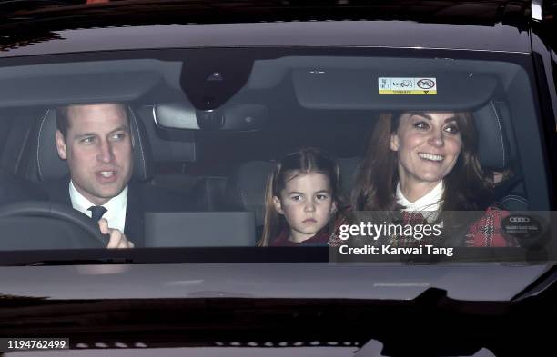 Prince William, Duke of Cambridge, Princess Charlotte of Cambridge and Catherine, Duchess of Cambridge attend Christmas Lunch at Buckingham Palace on...