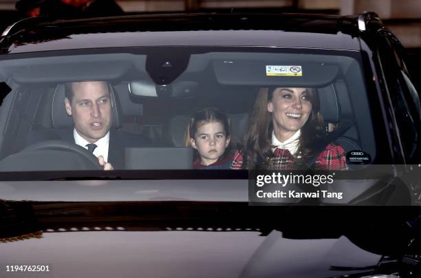 Prince William, Duke of Cambridge, Princess Charlotte of Cambridge and Catherine, Duchess of Cambridge attend Christmas Lunch at Buckingham Palace on...