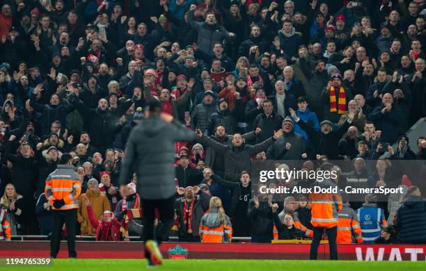 Liverpool manager Jurgen Klopp celebrates with fans after the game during the Premier League match between Liverpool FC and Manchester United at...