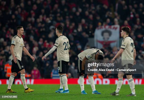 Manchester United react after the Premier League match between Liverpool FC and Manchester United at Anfield on January 19, 2020 in Liverpool, United...