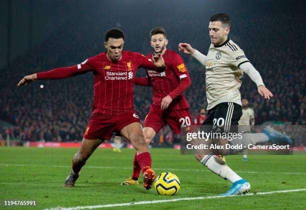 Manchester United's Diogo Dalot takes on Liverpool's Trent Alexander-Arnold during the Premier League match between Liverpool FC and Manchester...
