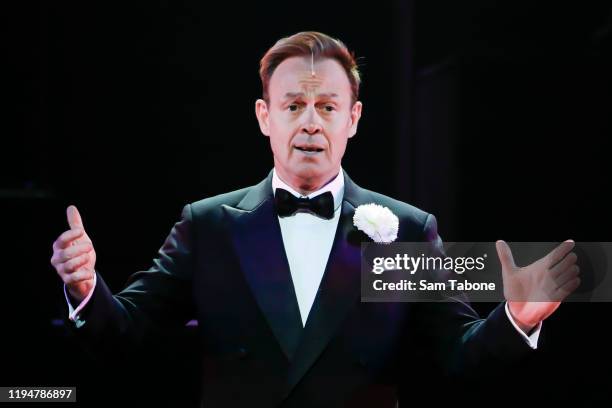 Jason Donovan performs on stage during a "Chicago The Musical" media call on December 19, 2019 in Melbourne, Australia.