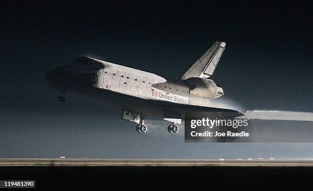 Space Shuttle Atlantis lands at Kennedy Space Center July 21, 2011 in Cape Canaveral, Florida. Atlantis was the final shuttle mission for NASA,...