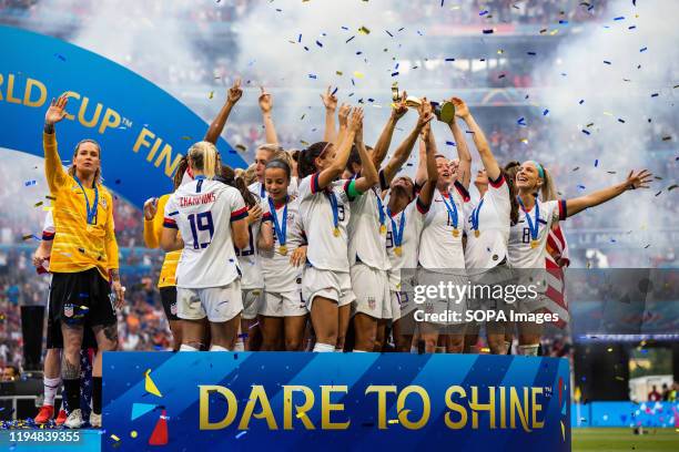 Women's national team celebrating with trophy after the 2019 FIFA Women's World Cup Final match between The United States of America and The...