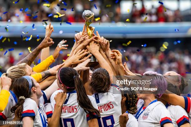 Women's national team celebrating with trophy after the 2019 FIFA Women's World Cup Final match between The United States of America and The...